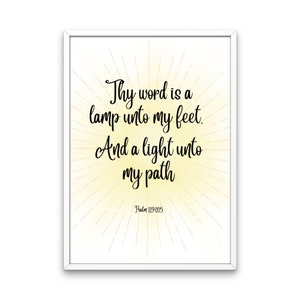 May include: A white framed print with a yellow background and black text that reads "Thy word is a lamp unto my feet. And a light unto my path Psalm 119:105".