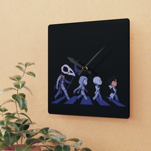 May include: A black clock with a white background featuring four cartoon characters walking across a crosswalk. The characters are a skeleton with a scythe, a hooded figure, a figure with a crown, and a figure with a crown and a sword. The clock hands are black and the clock face is white.