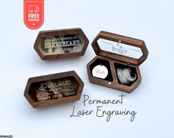 May include: Three hexagonal wooden keepsake boxes with clear lids. Two boxes are closed, displaying engraved text including "In Loving Memory of BRAVEHEART 2012-2022" and "Detroit 2014-2025 ALWAYS IN MY HEART". One open box contains a round metal tag and fur.