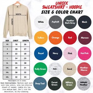 a white sweatshirt with a black and red logo on it