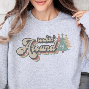 christmas sweatshirt, womens christmas, merry christmas, christmas squad, christmas hoodies, christmas, christmas sweater, christmas gifts, rocking around the christmas tree, rocking around, christmas tree.