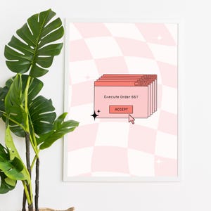 Peut inclure: Une affiche encadrée avec un fond à carreaux roses et blancs. L'œuvre d'art comprend une fenêtre d'ordinateur de style rétro avec le texte "Execute Order 66 ?" et un bouton "ACCEPTER". Un curseur survole le bouton.