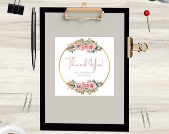 May include: A white card with a gold circle and pink flowers. The text inside the circle says "Thank You!" and "For Supporting My Cause".