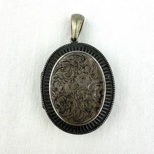 Victorian Silver Locket with Engraved Floral Design