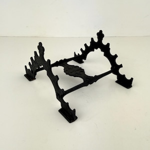 May include: A handmade wooden sign with the text "Welcome" in a cursive font. The sign is painted white with a distressed finish and features a small, decorative floral element. It is designed for indoor or outdoor use.