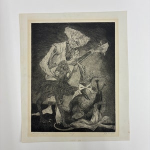 May include: A black and white etching titled Stranger Company featuring a central figure playing a stringed instrument, a tall furry creature, and a seated figure wearing a mask and hat. The print includes handwritten text at the bottom edge.