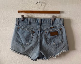 Wrangler light wash raw hem short shorts