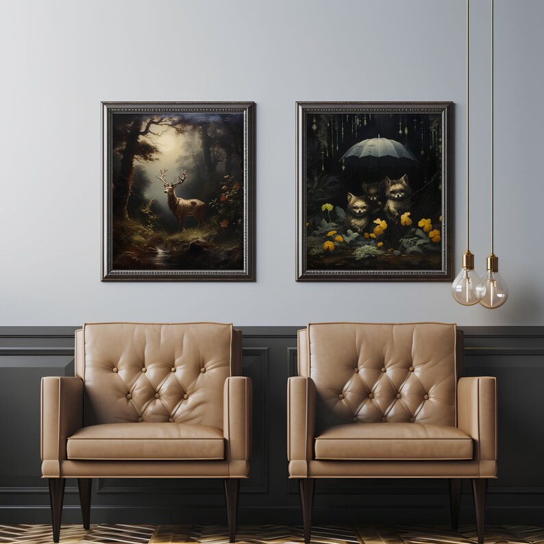 May include: Two framed paintings hanging on a wall above two brown leather armchairs. The painting on the left depicts a deer in a forest setting. The painting on the right depicts three small animals under an umbrella in a forest setting.