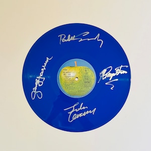 The Beatles 1967-1970 Disco de vinilo azul de edición limitada autografiado