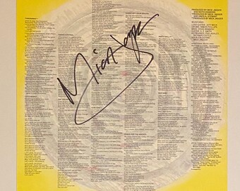 Capa interna do LP autografada por Mick Jagger com certificado de autenticidade.