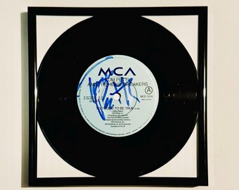 Disco de vinil autografado por Tom Petty com certificado de autenticidade e moldura.