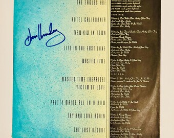 Capa interna do LP autografada por Don Henley dos Eagles com certificado de autenticidade.