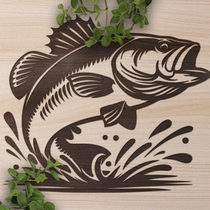 May include: A black and white illustration of a bass fish jumping out of the water. The fish is detailed with fins, scales, and a mouth open wide. The water is depicted with stylized waves.