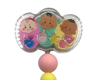 Carrete de insignias Baby Shaker