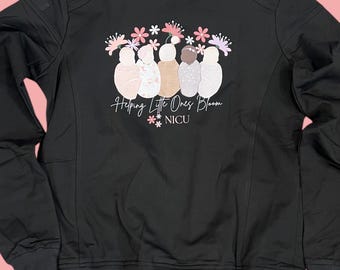 Chaqueta - Ayudando a los pequeños a florecer en la UCIN