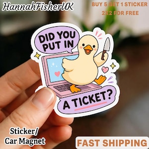 May include: A die-cut sticker featuring a cartoon yellow duck holding a small knife, standing on a pink laptop. The speech bubble contains the text DID YOU PUT IN A TICKET? The design includes small pink hearts and sparkles on a white background.