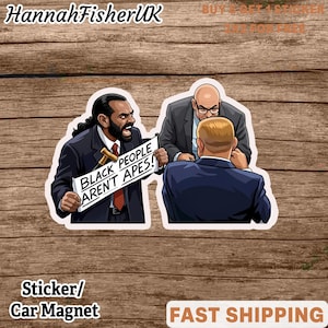 May include: A sticker or car magnet featuring a cartoon illustration of three men in suits. One man holds a sign that reads "BLACK PEOPLE AREN'T APES!" The sticker has a white border and is set against a wood grain background.