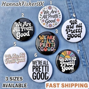 Könnte beinhalten: Eine Sammlung von sieben runden Ansteckbuttons mit dem Schriftzug "We Are All Pretti Good" in verschiedenen Designs und Farben. Einige Buttons zeigen florale oder Retro-Regenbogen-Grafiken. Der Text "3 SIZES AVAILABLE" ist ebenfalls sichtbar.