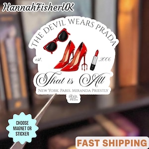 May include: A sticker featuring a design inspired by "The Devil Wears Prada." The design includes red sunglasses, high heels, and lipstick. Text includes "THE DEVIL WEARS PRADA," "That is All," and "NEW YORK. PARIS. MIRANDA PRIESTLY."