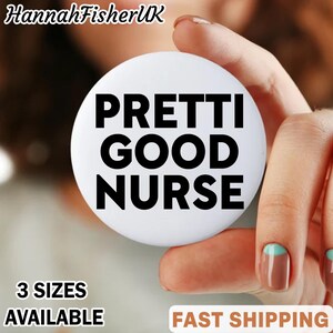 May include: A white badge with the words "PRETTI GOOD NURSE" in large, black letters. The badge is held in a hand. The text "3 SIZES AVAILABLE" is at the bottom.