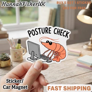 May include: A die-cut sticker featuring a cartoon orange shrimp sitting at a computer with a keyboard and mouse. The text POSTURE CHECK is printed in black capital letters above the shrimp. The design has a white border and a matte finish.