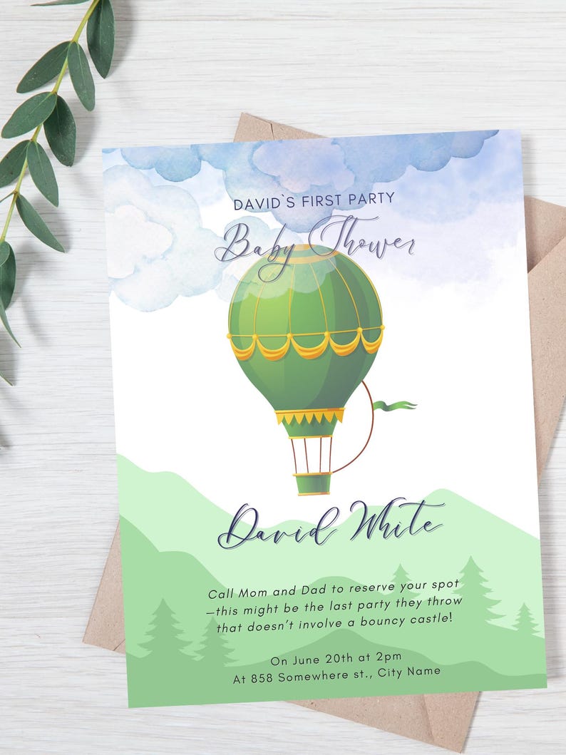 It has a whimsical and soft watercolor design featuring a hot air balloon floating in the sky with fluffy clouds. The color scheme consists of green, blue, and gold tones, creating a dreamy and elegant aesthetic.