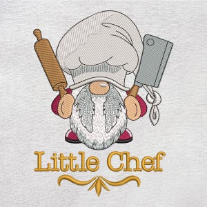 May include: Embroidered image of a gnome chef holding a rolling pin and a cleaver. The gnome wears a tall white chef's hat, a long white beard, and a red and white outfit. The text "Little Chef" is displayed in gold lettering below the gnome.