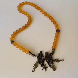 Ręcznie robiony naszyjnik z koralików agatowych: biżuteria w stylu boho