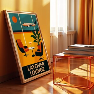 May include: A framed poster with a retro travel theme, featuring an airplane, chairs, and the text "LAYOVER LOUNGE." An orange acrylic side table holds stacked books. The scene is bathed in warm sunlight, with orange curtains and a yellow wall.