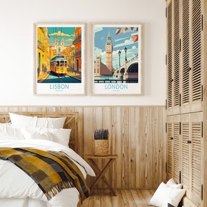 May include: Two framed travel posters, one depicting a yellow tram in Lisbon, Portugal, and the other showing Big Ben and a bridge in London, England.