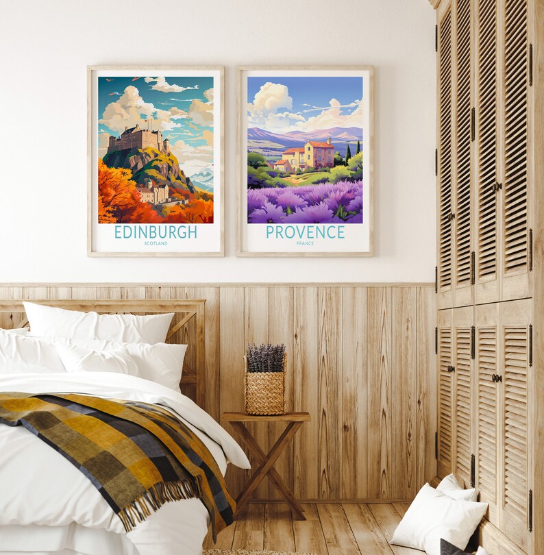 May include: Two framed travel posters with vintage illustrations. The poster on the left shows Edinburgh Castle in Scotland with a fall foliage background. The poster on the right shows a lavender field in Provence, France.