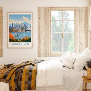 May include: A framed poster featuring a colourful illustration of the Vancouver skyline, showcasing the city's famous buildings and harbour. The poster is titled "Vancouver, Canada".