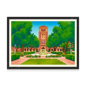 May include: A framed print of a university building with a tall tower, surrounded by green trees and a manicured lawn. The building is made of red brick and has a fountain in front.