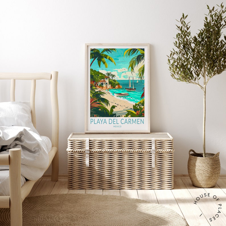 May include: A framed poster with a colorful illustration of a beach scene in Playa del Carmen, Mexico. The poster features palm trees, a white building, sailboats, and turquoise water. The text "PLAYA DEL CARMEN" and "MEXICO" is printed on the poster.