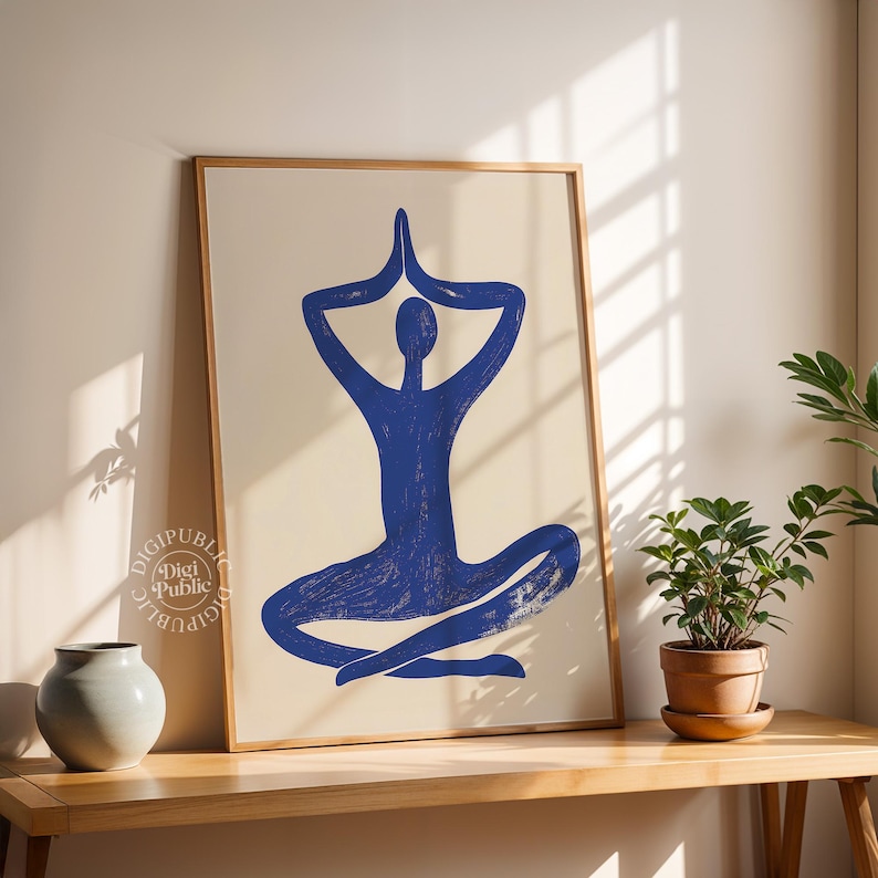 Minimalist abstract figure in a blue yoga pose with hands in prayer over head, sitting cross-legged on a cream background — perfect for serene interior design or meditation spaces.