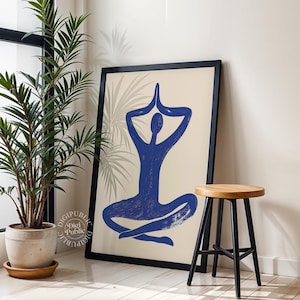 Minimalist abstract figure in a blue yoga pose with hands in prayer over head, sitting cross-legged on a cream background — perfect for serene interior design or meditation spaces.