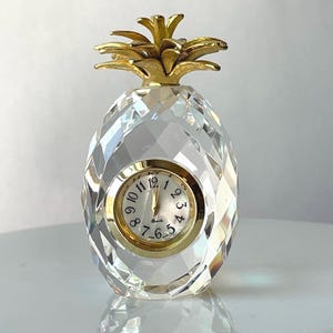 May include: A set of three ceramic mugs with a speckled, matte finish. The mugs are in shades of cream, light gray, and dark gray. Each mug has a simple, minimalist design and a rounded handle.