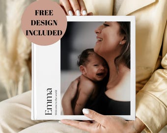 May include: A white photo book with the name "Emma" and the text "Welcome to the world" printed vertically. The book features a black and white photo of a mother holding a baby. A pink circle with the text "FREE DESIGN INCLUDED" is in the upper left corner.