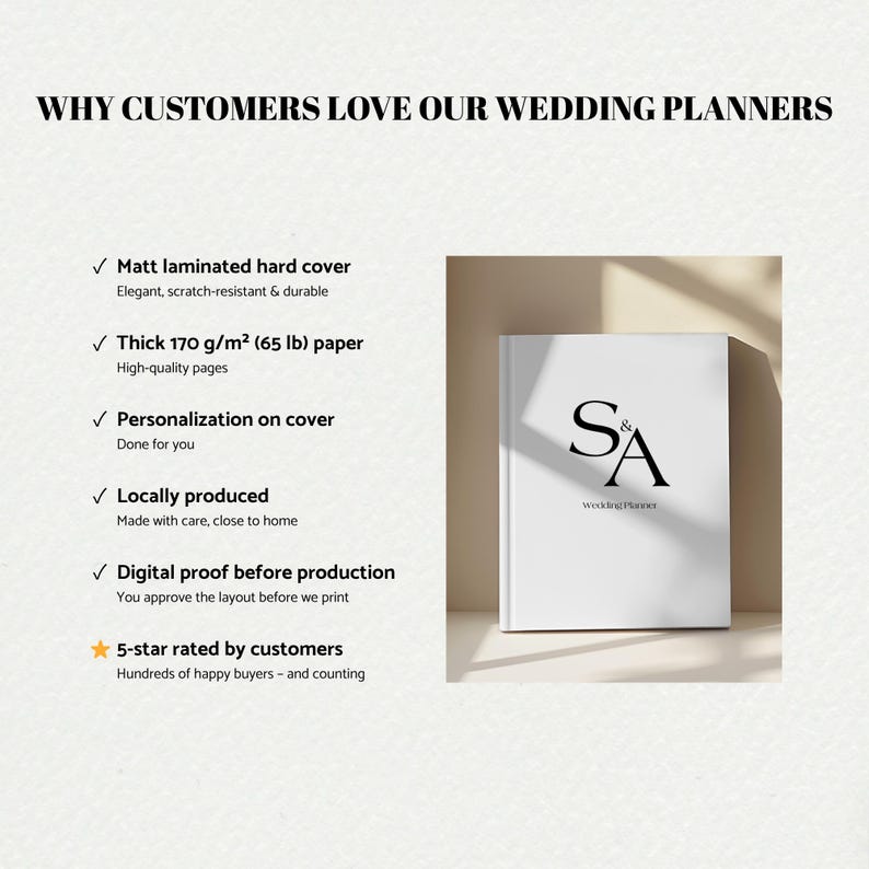 May include: A white wedding planner with the initials "S&A" in black on the cover. The planner has a matt laminated hard cover and thick 170 g/m&sup2; (65 lb) paper. Text on the image reads "Why customers love our wedding planners."