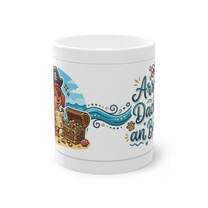 May include: White ceramic mug featuring a cartoon pirate dog with a treasure chest on a beach scene. The mug has the text "Arrr Dad an B" in blue script with paw prints and a skull and crossbones.