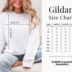 The image is a size chart for a crew neck sweatshirt, showing measurements in inches for different sizes.