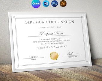 May include: A framed certificate of donation with a white border. The certificate has black text, including "Certificate of Donation" and spaces for recipient and charity information. A gold seal is at the bottom.