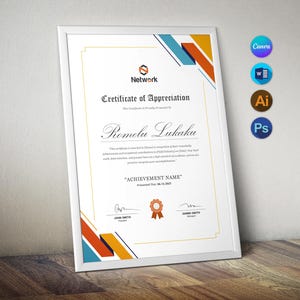 May include: A framed certificate of appreciation with the text "Network" at the top. The certificate has a white border and features the name "Romelu Lukaku" and the text "ACHIEVEMENT NAME". The design includes orange, blue, and gold accents.
