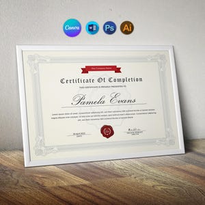 May include: A framed certificate of completion with a cream-colored background. The certificate features the text "Certificate Of Completion" and the name "Pamela Evans" in elegant script. A red ribbon and seal add decorative elements.