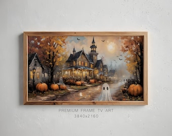 May include: A framed Halloween-themed artwork depicts a spooky village scene. The painting features a large house with lit windows, pumpkins, and ghosts. The artwork is framed in a light brown wooden frame. Text at the bottom reads "PREMIUM FRAME TV ART 3840x2160".