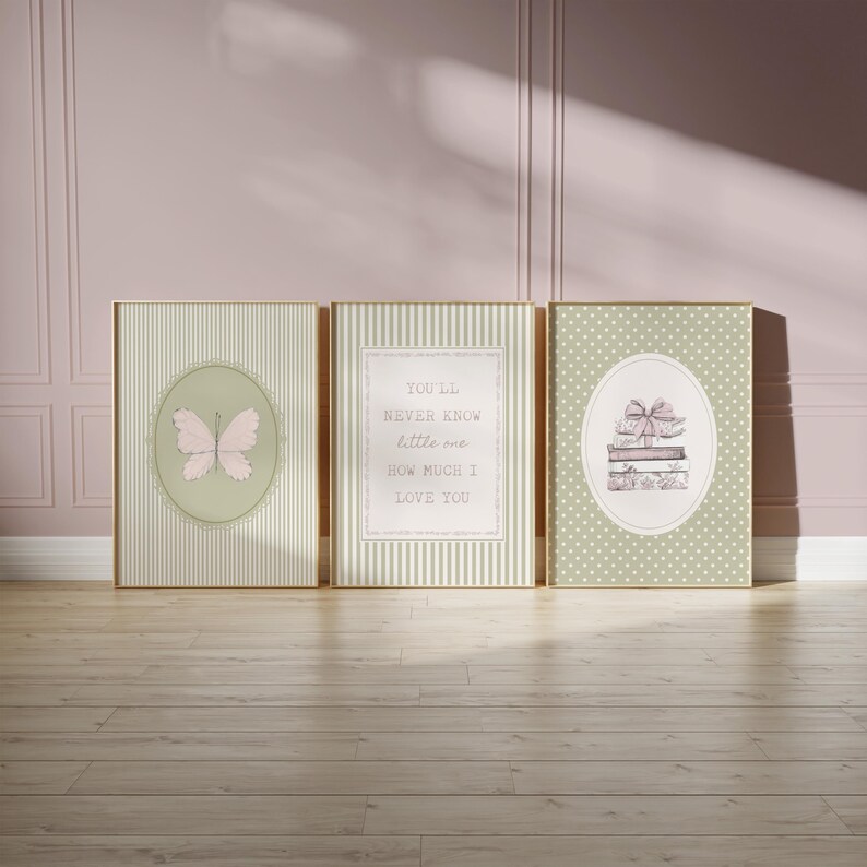 May include: Three framed art prints with gold frames. The prints feature a butterfly, text that reads "You'll never know little me how much I love you", and a stack of books with a bow. The backgrounds are striped and dotted.