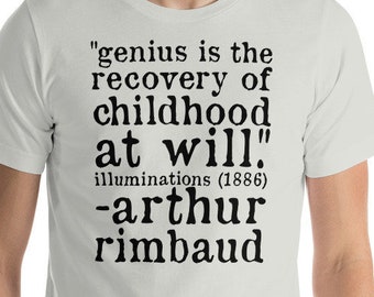 May include: A light grey t-shirt with the quote "genius is the recovery of childhood at will." in black text. The text also includes "illuminations (1886) - Arthur Rimbaud."