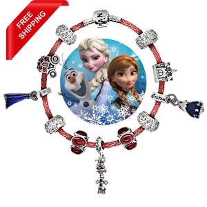 May include: Red leather charm bracelet with silver charms featuring Frozen characters, including Elsa, Anna, and Olaf. The charms include a snowflake, a castle, and a crown.