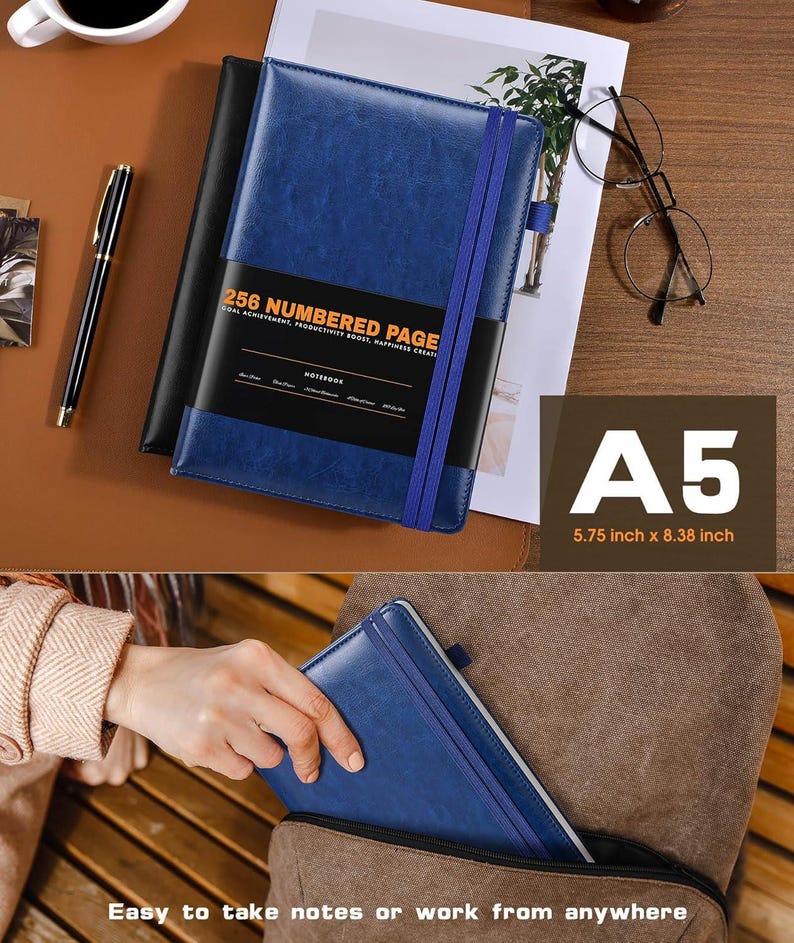 May include: A blue A5 notebook with 256 numbered pages, a black band, and a blue elastic band. The notebook is 5.75 inches x 8.38 inches. The text on the notebook reads "Goal Achievement, Productivity Boost, Happiness Creati".