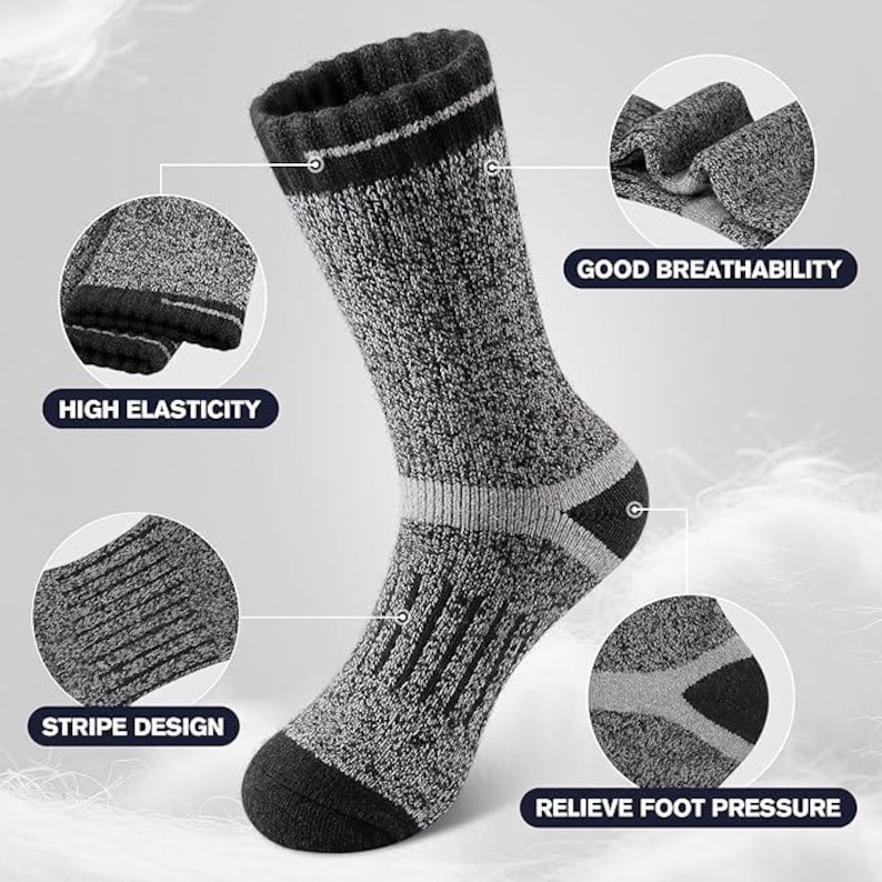 May include: A gray and black sock with a ribbed cuff and a reinforced heel and toe. The sock features a stripe design and is labeled with "HIGH ELASTICITY", "GOOD BREATHABILITY", and "RELIEVE FOOT PRESSURE".